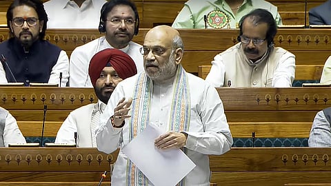 Union Home Minister Amit Shah speaks in the Lok Sabha during the Budget session of Parliament, in New Delhi, Wednesday, April 2, 2025.