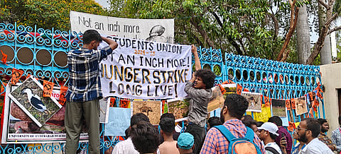 Students of University of 
Hyderabad protest against the Land auction issue inside the campus at Gachibowli in Hyderabad on Thursday