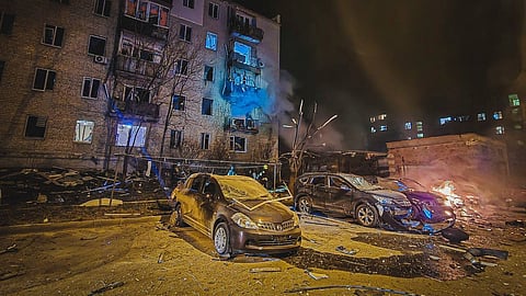 In this photo provided by the Ukrainian Emergency Service, firefighters put out the fire following Russia's drone attack in Kharkiv, Ukraine, Thursday, April 3, 2025.