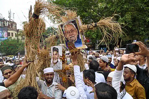 Members of various Muslim organisations take part in a protest against the passage of the Waqf (Amendment) Bill in the Parliament, in Kolkata, Friday, April 4, 2025.