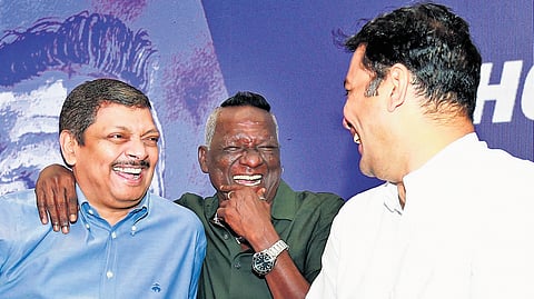 Footballer I M Vijayan shares a hearty moment with KFA president Navaz Meeran and MP Hibi Eden at an event held to honour him at IMA Hall, Kochi.