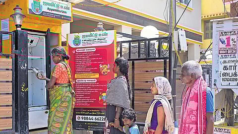 A sign reads ‘Ayyamittu Unn’, a call to “share the food with the needy before you eat”.