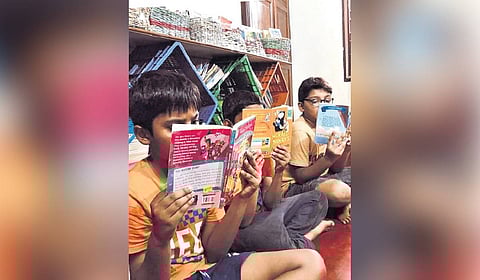 Children who have engaged in various activities at Purple Space library in Manipal.