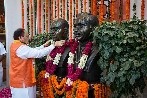 Union Minister and BJP National President JP Nadda pays floral tribute to Syama Prasad Mookerjee and Pandit Deendayal Upadhyaya on the occasion of the party's foundation day, at the party's headquarters.