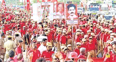 CPM cadre taking out a flag march in Madurai on Sunday