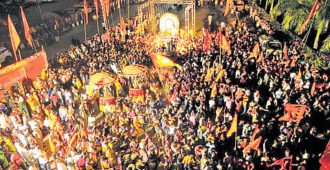 Thousands of people taking part in a massive Ram Navami procession in Sambalpur city on Sunday | express