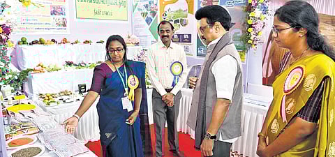 Chief Minister MK Stalin looking at the products displayed by the agriculture engineering department at an exhibition in Ooty Arts College 