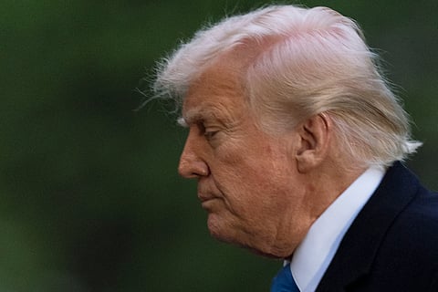 President Donald Trump arrives at the White House on Marine One, Sunday, April 6, 2025, in Washington.