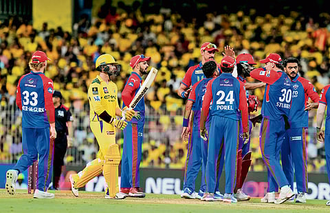 Players of Delhi Capitals celebrate Chennai Super Kings opener Devon Conway's wicket at Chepauk on Saturday