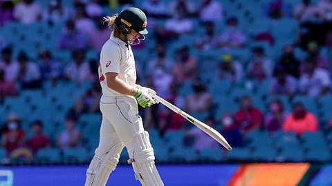 In this photo from Jan. 9, 2021, Australia's Will Pucovski walks from the field after he was dismissed during play on day three of the third cricket test between India and Australia at the Sydney Cricket Ground, Sydney, Australia.