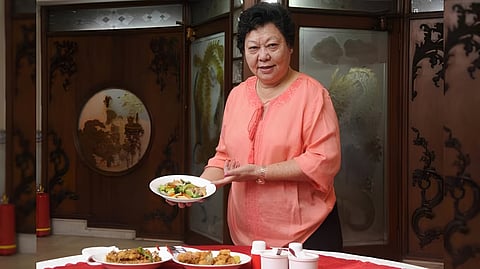 Monica Liu in her restaurant, 'Beijing'. She has always been a strict boss in her kitchen, but says her staff is family.