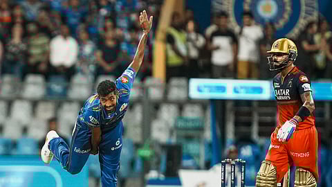 Mumbai Indians' Jasprit Bumrah bowls a delivery during the Indian Premier League (IPL) 2025 cricket match between Mumbai Indians and Royal Challengers Bengaluru, at the Wankhede Stadium in Mumbai, Monday, April 7, 2025.