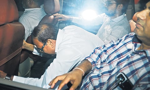 ED officials with 
KN Ravichandran leave agency office at Nugambakkam after an inquiry