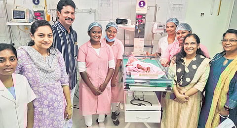 Nidhi with the hospital staff