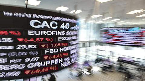 Market indicators are displayed on a digital screen at the Euronext trading exchange building in the La Defense business district, west of Paris, on April 7, 2025.