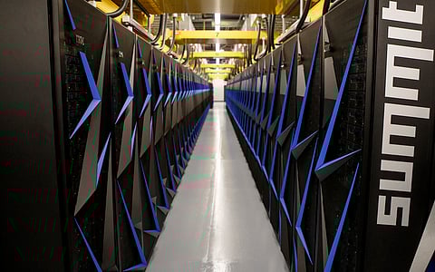 In this photo from June 10, 2019, the Summit supercomputer is seen on the campus of Oak Ridge National Laboratory in Oak Ridge, Tennessee, USA.