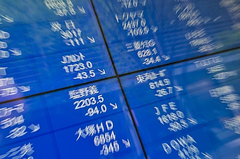 This general view shows an electronic board with stocks mostly down in morning trading on the Tokyo Stock Exchange in Tokyo on April 11, 2025.