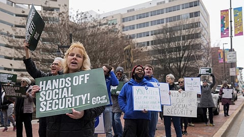 Demonstrators gather outside of the Edward A. Garmatz United States District Courthouse in Baltimore, on March 14, 2025, before a hearing regarding the Department of Government Efficiency's access to Social Security data.