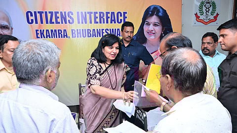 Bhubaneswar MP Aparajita Sarangi handing the booklet to the public on Thursday 