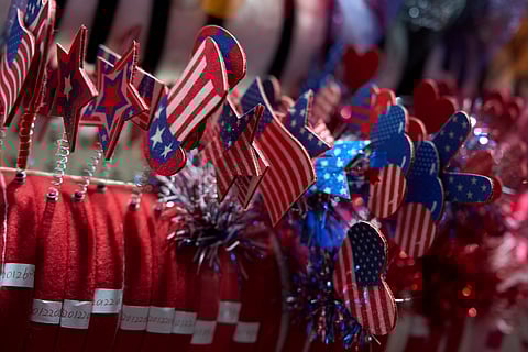 U.S. flag themed wearables are displayed at the Yiwu International Trade Market in Yiwu, eastern China's Zhejiang province, Thursday, April 10, 2025. 