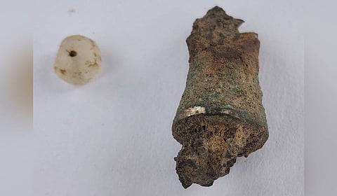 An ancient copper object filled with iron