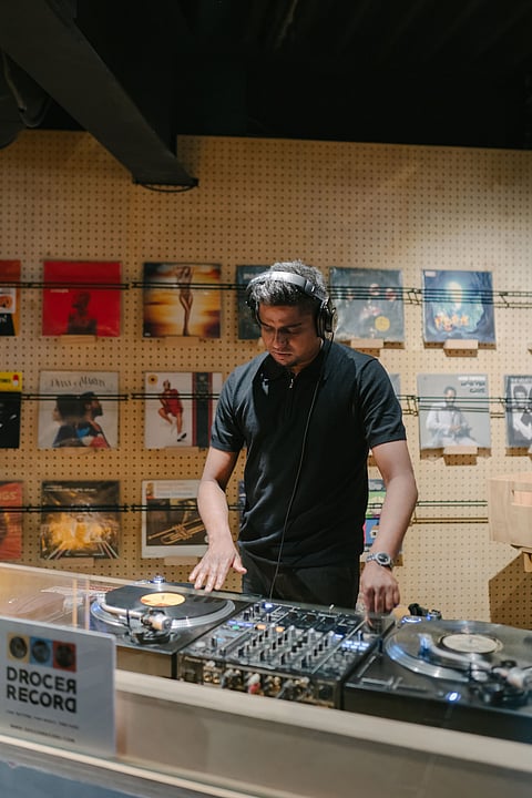 DJ Sandeep Raman using a vinyl deck