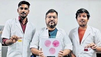 Sarkar (centre) and his team members with the intelligent film 