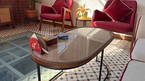Argha Sarkar's terrace space featuring a rattan table