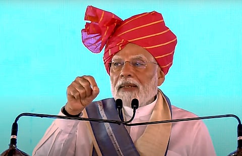 In this screenshot image from @narendramodi via Youtube on Monday, April 14, 2025, Prime Minister Narendra Modi addresses a gathering during laying of foundation stone and inauguration of various development projects, in Yamuna Nagar, Haryana.