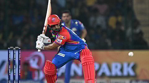 Delhi Capitals' Karun Nair plays a shot during the Indian Premier League (IPL) Twenty20 cricket match between Delhi Capitals and Mumbai Indians at the Arun Jaitley Stadium in New Delhi on April 13, 2025.