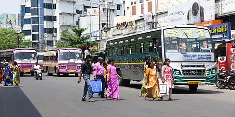Buses are parked in front of commercial complexes around the Chathiram bus stand in Tiruchy.