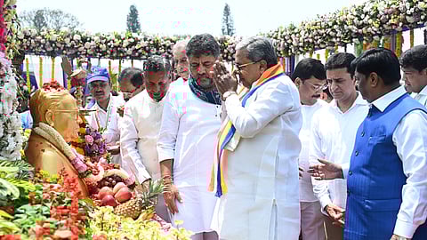 Chief Minister Siddaramaiah with DCM DK Shivakumar and others garland a bust and the statue of Dr BR Ambedkar on his 135th birth anniversary at Vidhana Soudha in Bengaluru on Monday.