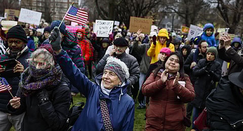Hundreds of demonstrators gather on Cambridge Common during a rally at the historic park in Cambridge, Mass., Saturday, April 12, 2025, calling on Harvard University to resist what organizers described as attempts by President Trump to influence the institution. 