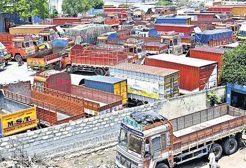 Trucks parked at the APMC Yard in Bengaluru on Tuesday 