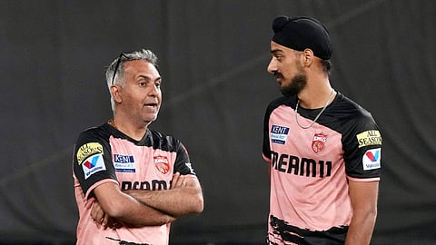 Ashish Tuli (left) with Arshdeep Singh, one of the many players unearthed by Tuli and his team at the franchise 