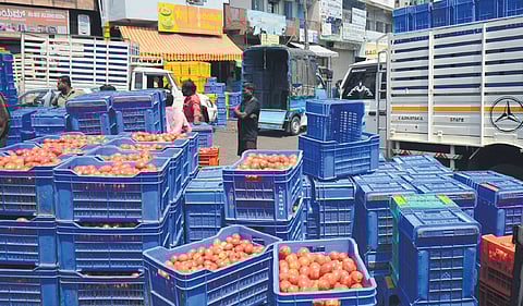 Vegetables loaded at KR Market in auto rickshaws in Bengaluru on Wednesday, due to an indefinite strike called by lorry owners association