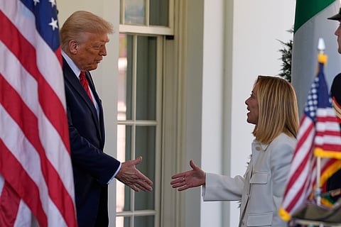 President Donald Trump greets Italy's Prime Minister Giorgia Meloni at the White House, Thursday, April 17, 2025, in Washington. 