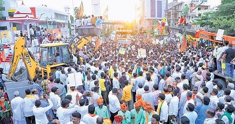 BJP workers gather in large numbers, as senior party leaders undertake the Janakrosh Yatra, in Vijayapura on Thursday