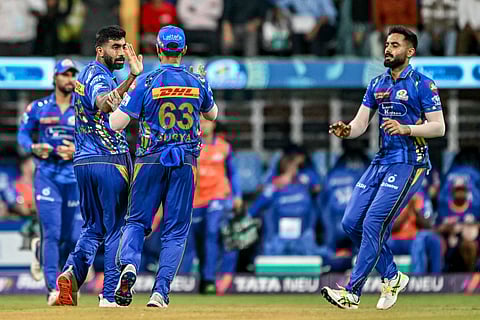 Jasprit Bumrah (second from left) broke through Heinrich Klaasen's defences with a full delivery 
