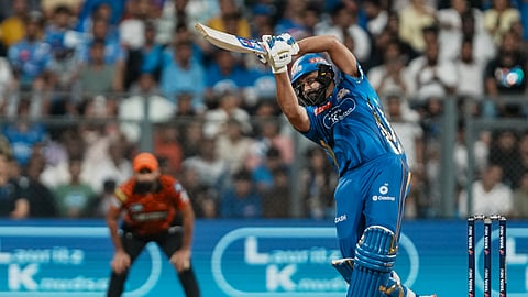 Mumbai Indians' Rohit Sharma plays a shot during the IPL T20 match between Mumbai Indians and Sunrisers Hyderabad at the Wankhede Stadium, in Mumbai, Thursday, April 17, 2025.