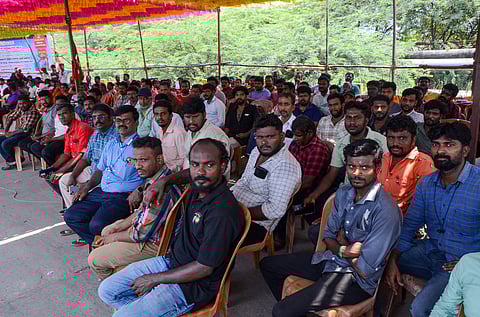 Contract labourers protest in front of NTPL, Thoothukudi, on Friday, demanding the implementation of court orders,