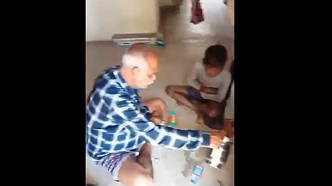 A government school teacher in Katni, Madhya Pradesh, was caught on video offering liquor to his students.