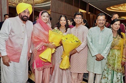 Punjab Chief Minister Bhagwant Mann and his wife Dr. Gurpreet Kaur at Arvind Kejriwal’s daughter's wedding. 
