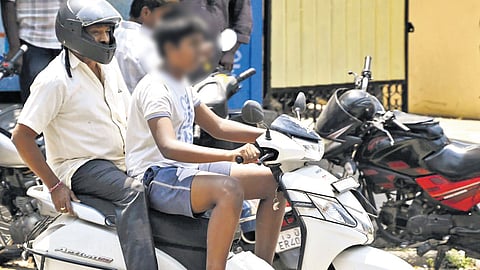 A minor driving a two-wheeler.