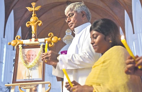 People paying respects to pope at a church in Chennai 