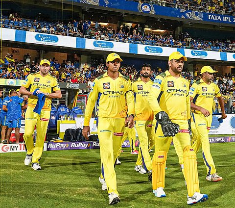 CSK players walk on to the field during their IPL match against Mumbai Indians on Sunday, April 20, 2025