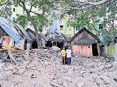 Barely 13 makeshift houses remain on the streets of Ramdoss Nagar in Moolakothalam, surrounded by broken walls and heaps of debris 