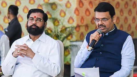 Maharashtra Chief Minister Devendra Fadnavis (R) of the BJP, with Deputy Chief Minister Eknath Shinde of the Shiv Sena.