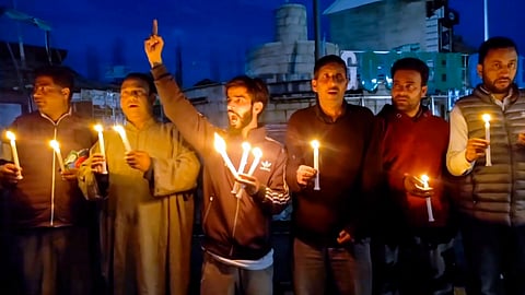 People hold a candlelight march after terrorists attacked a group of tourists at Pahalgam in J&K's Anantnag district, at Handwara in Kupwara district, J&K, Tuesday, April 22, 2025. 
