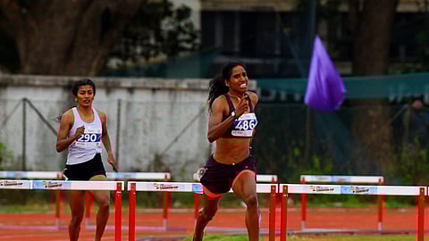 Vithya Ramraj of Tamil Nadu during the 400m hurdles in Kochi on Wednesday